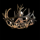 Big Sky Elk & Mule Deer Antler Chandelier illuminated, showing interwoven elk and mule deer antlers