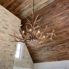 Yellowstone Elk Antler Chandelier viewed from below at an angle, showing the full spread of tiered elk antlers