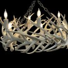 Renegade mule deer whitetail antler chandelier in bleached white antler finish with eight lit candle bulbs, studio shot