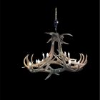 Wilderness Elk Antler Chandelier lit on black background, front view