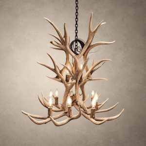Aspen 2-tier mule deer antler chandelier in natural finish, lit with 10 candle-style bulbs on a black iron chain