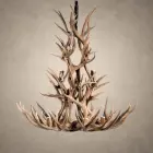 Front view of the Cascade 3-tier mule deer antler chandelier showing the tall layered antler silhouette