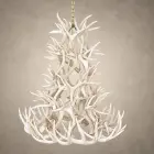 6 tier whitetail antler chandelier in bleached white antler finish, hanging from a brass chain