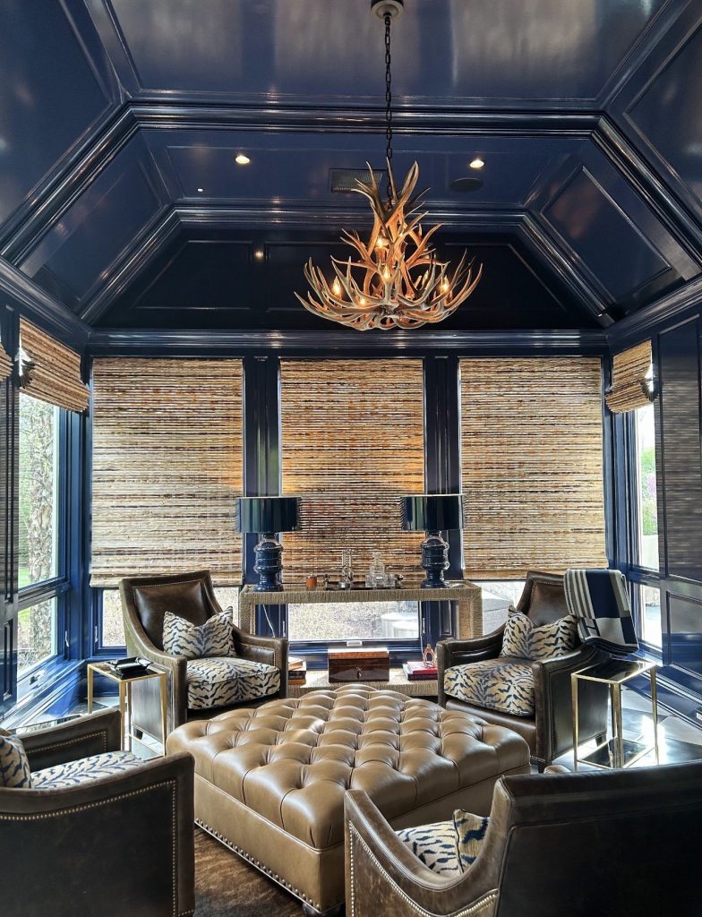 Natural mule deer antler chandelier in navy lacquered smoking room