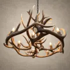 Angled view of the Big Sky antler chandelier showing layered elk and mule deer antler around the lights