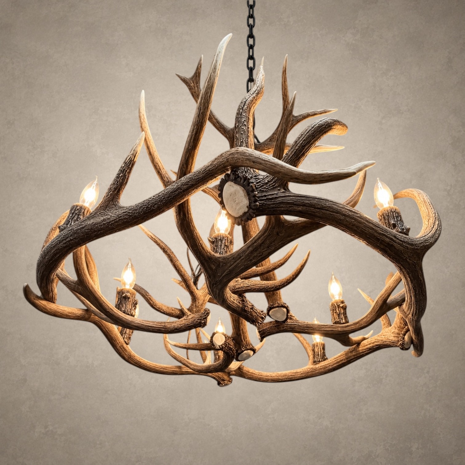 Angled view of the Big Sky antler chandelier showing layered elk and mule deer antler around the lights