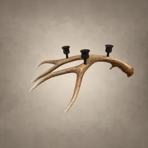 Mule deer antler candelabra – Large Deer 3 Candle: a natural deer antler with three dark candle cups set along the beam