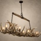 Angled view of the Roundup rectangular whitetail antler chandelier showing layered antler and two antler towers