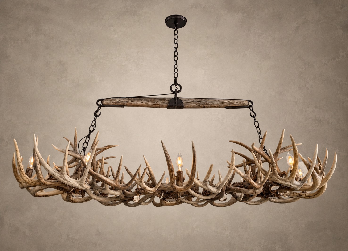 Rectangular Whitetail Antler Chandelier – Roundup Roundup rectangular whitetail antler chandelier lit, front view, handmade from genuine whitetail deer antler