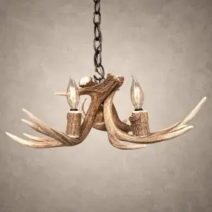 Single Tier Fawn whitetail antler chandelier, a compact 3-light fixture of crossed natural whitetail antler hanging from a dark iron chain