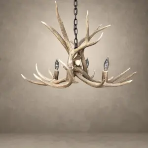 Osprey single tier mule deer antler chandelier with four candle-style lights hanging from a black iron chain, front view