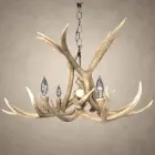Side view of the Osprey mule deer antler chandelier showing crossed antler beams and candle sockets