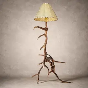 Wapiti elk antler floor lamp with a laced rawhide shade, built from real bull elk antlers