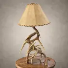 Whitetail antler table lamp – Silverbow from a second angle, showing the stacked whitetail deer antler base and rawhide shade