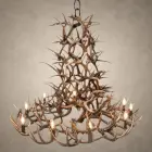 XL 6 Tier Whitetail Antler Chandelier lit, six interlocking tiers of real whitetail deer antler with candle-style bulbs, hanging from an iron chain